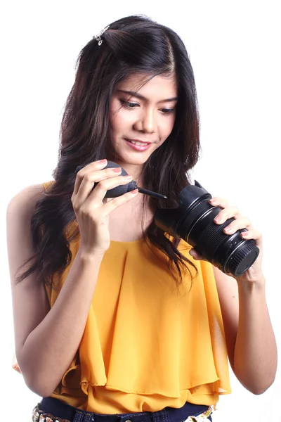 Cute woman cleaning the len — Stock Photo, Image