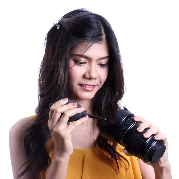 Cute woman cleaning the len — Stock Photo, Image