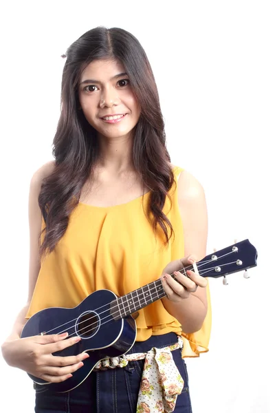 Cute asian woman playing ukulele — Stock Photo, Image