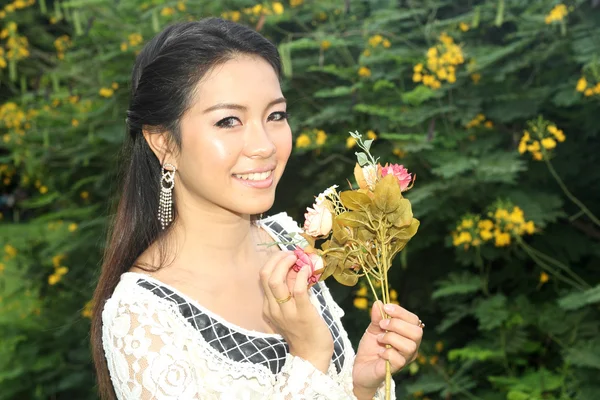 Woman and flower — Stock Photo, Image