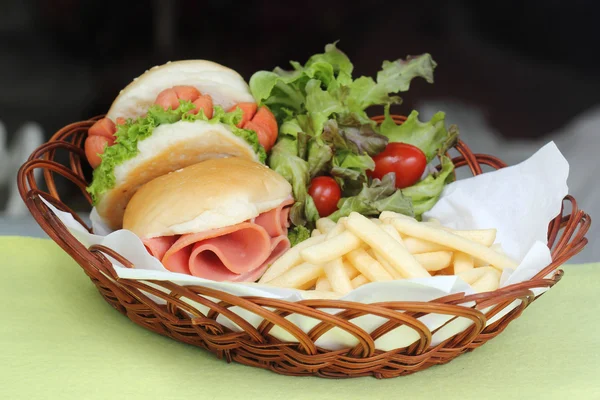 Freshly Hamburger in a basket — Stock Photo, Image