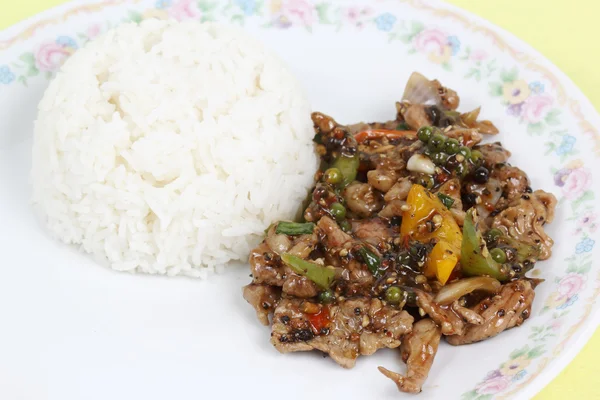 Stir fried beef with black hot pepper and steam rice — Stock Photo, Image