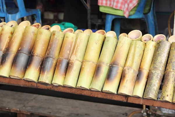 Stock image rice roasted in bamboo joints