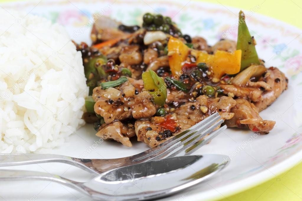 Stir fried beef with black hot pepper and steam rice