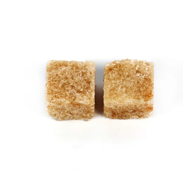 Cubos de açúcar de cana marrom — Fotografia de Stock