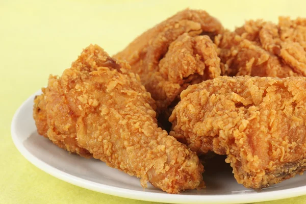Fresh fried chicken on a white plate — Stock Photo, Image