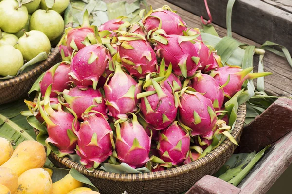 Pink pitahaya dragon fruit in basket — Stock Photo, Image