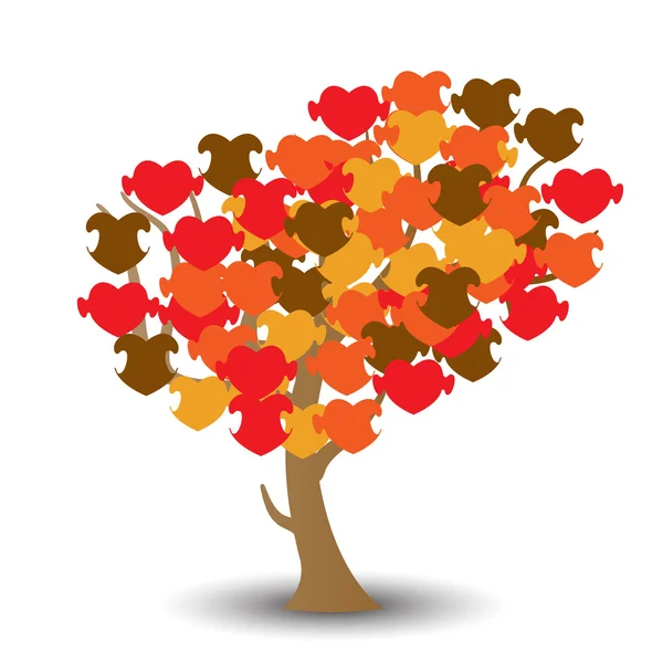 Tree with puzzles as heart — Stock Vector