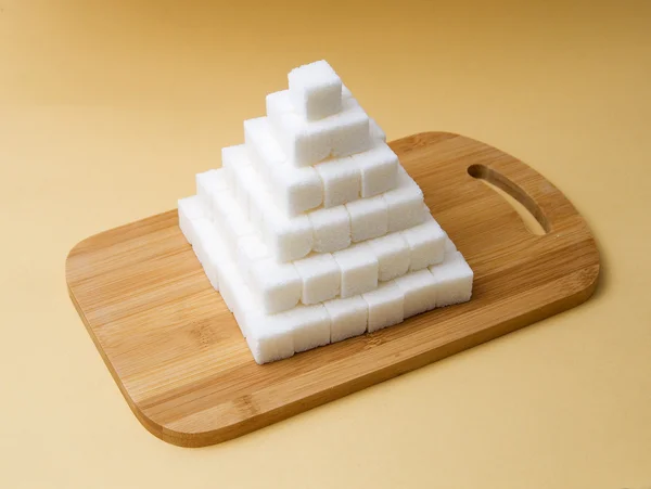 Sugar cubes pyramid — Stock Photo, Image