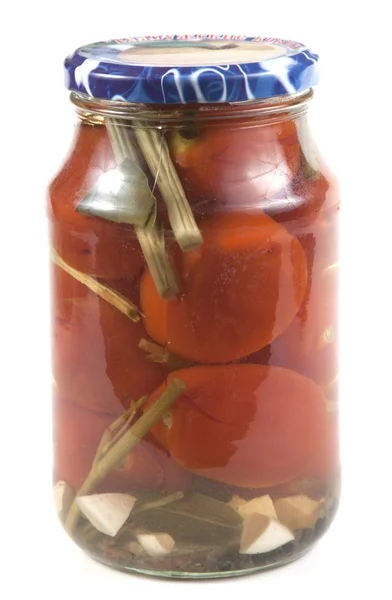 Preserved tomatoes in a jar — Stock Photo, Image