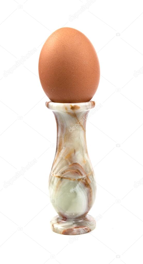 Egg on a stone vase