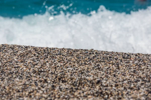 Pebble strand bakgrund — Stockfoto