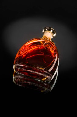 Whiskey, cognac, brandy, bourbon, rum, scotch. Strong alcohol drink close-up..