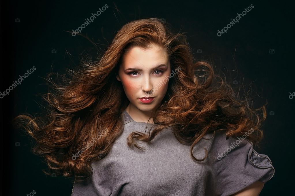 Portrait Of Young Beautiful Woman With Long Flowing Hair Stock Photo Image By C Tsyhanova