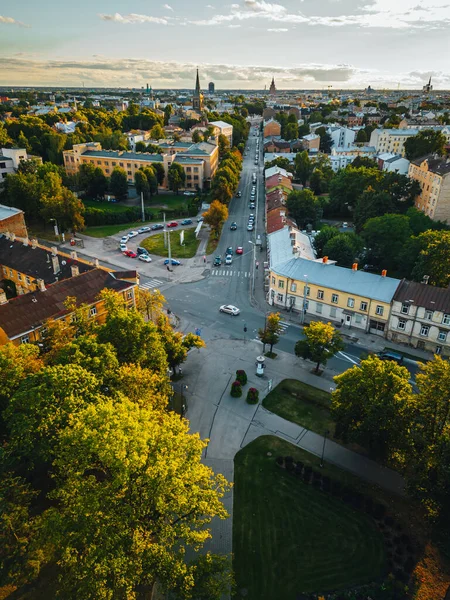 Road junction in European city, evening traffic in Riga, Latvia