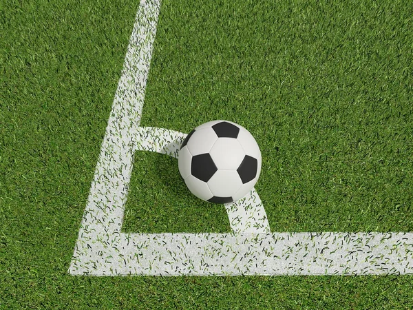 橄榄球或足球在康纳上绿草字段中 — 图库照片