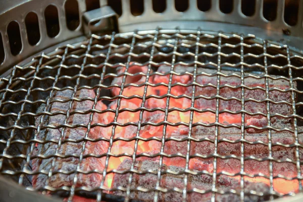 Charcoal fire grill with live flames — Stock Photo, Image