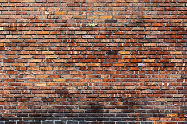 Il vecchio muro di mattoni rossi — Foto Stock