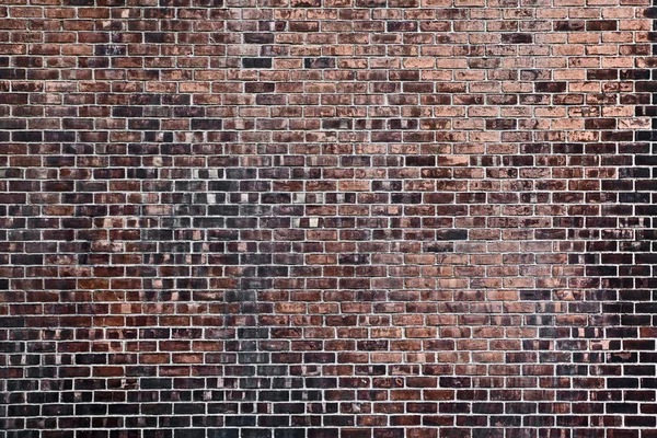 Старая красная кирпичная стена — стоковое фото
