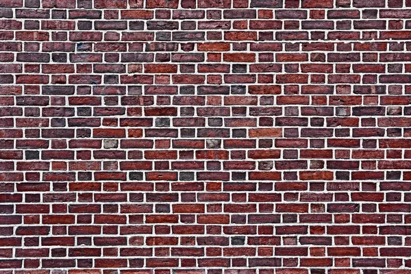 De oude rode bakstenen muur — Stockfoto