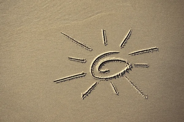 Bild der Sonne auf dem Sand — Stockfoto