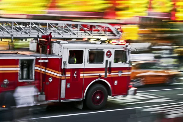 Fire trucks and firefighters brigade in the city — Stock Photo, Image