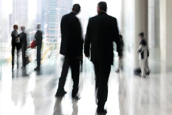 group of people in the lobby business center