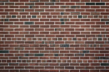 Eski kırmızı tuğla duvar.