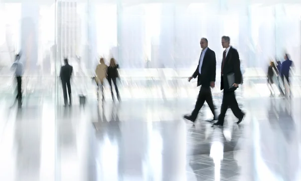 Group of people in the lobby business center — Stock Photo, Image