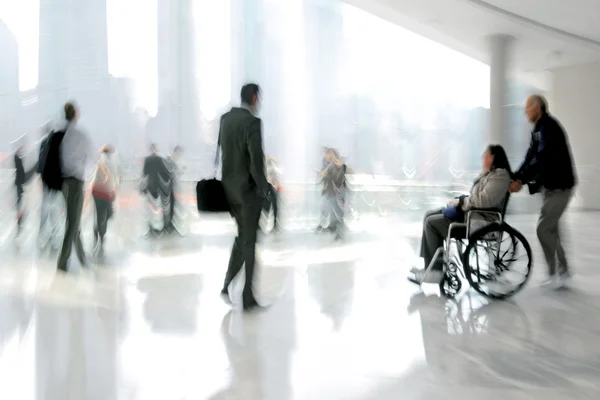 Group of people in the lobby business center — Stock Photo, Image