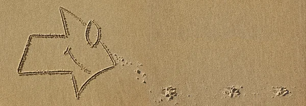 Le signe de la flèche avec le visage souriant et avec des empreintes de pas d'animal — Photo