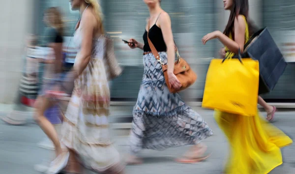 People shopping in the city Stock Picture