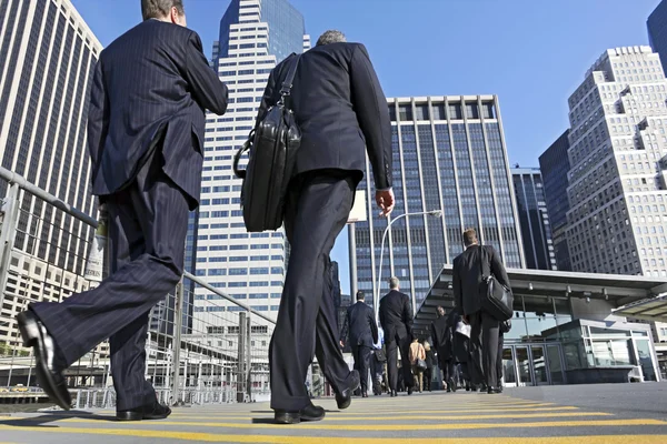 Business people walking on the street — Stock Photo, Image