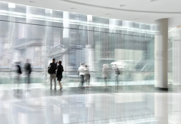 group of people in the lobby business center