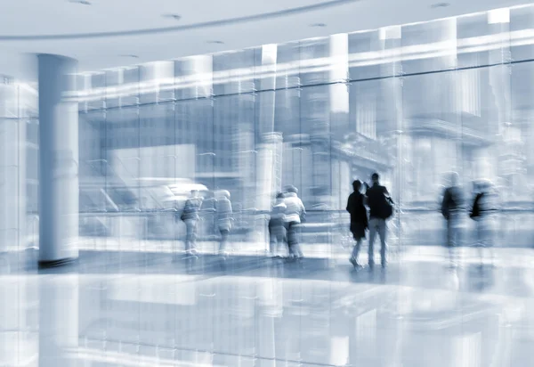 group of people in the lobby business center