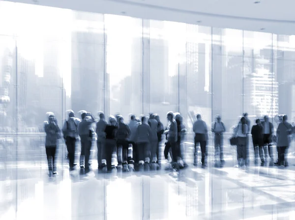 group of people in the lobby business center