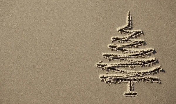 Images christmas tree in the sand — Stock Photo, Image