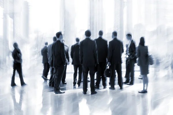 Group of people in the lobby business center — Stock Photo, Image