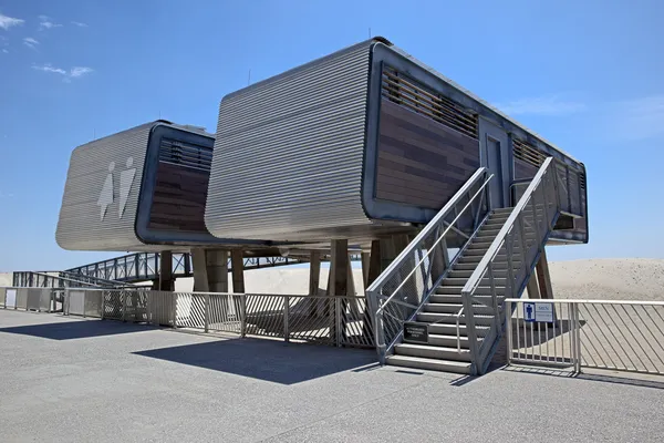 Beach shelters on the sea coast — Stock Photo, Image