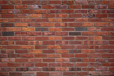 Eski kırmızı tuğla duvar.