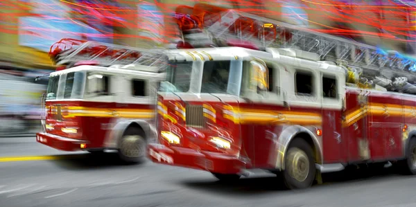 Fire trucks and firefighters brigade in the city — Stock Photo, Image
