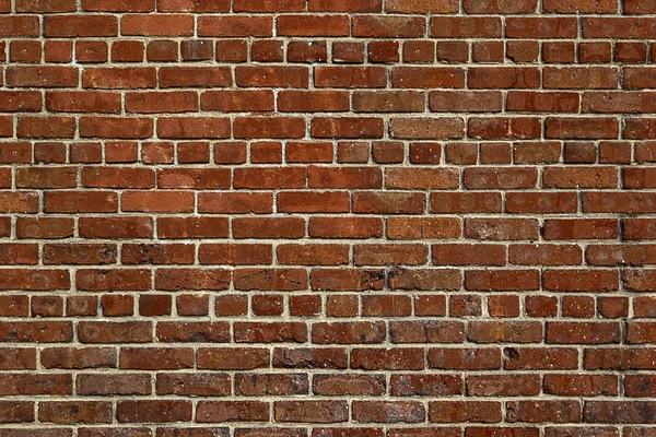 De oude rode bakstenen muur — Stockfoto