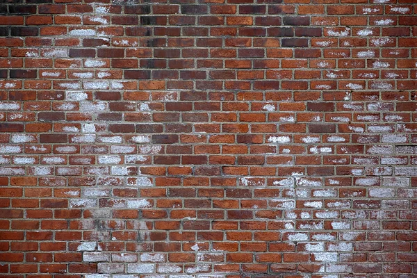 Старая красная кирпичная стена — стоковое фото