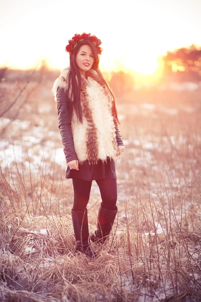 Young woman in fur vest — Stock Photo, Image