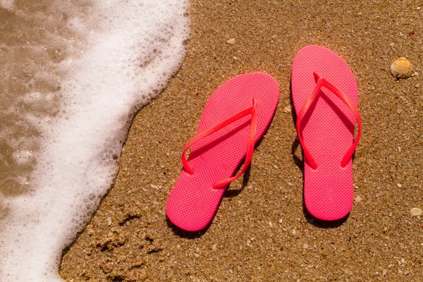 Flip Flops in the water Royalty Free Stock Images