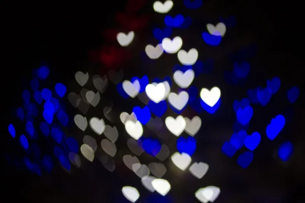 Corazón en forma de Bokeh luces de vacaciones de fondo —  Fotos de Stock