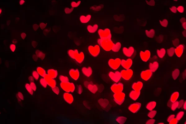 Corazón en forma de Bokeh luces de vacaciones de fondo — Foto de Stock