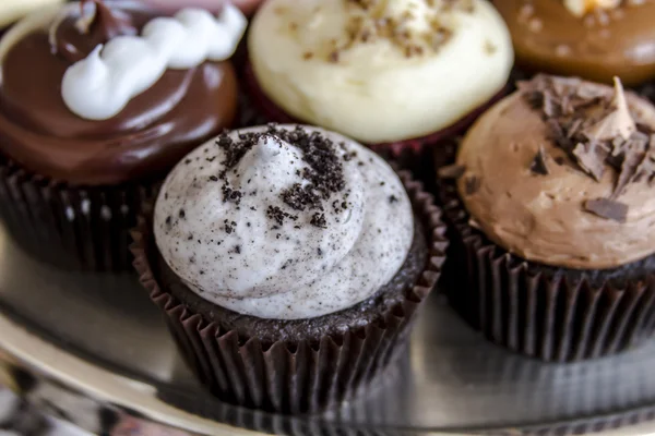 Diverse smaken van cupcake op display — Stockfoto