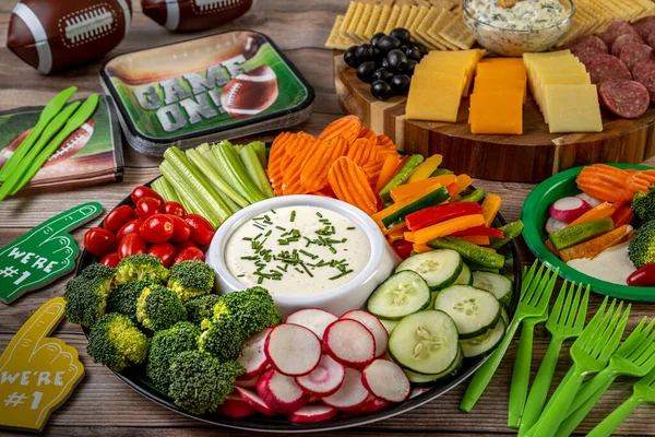 Football Tailgate Themed Party Food Display Vegetable Platter Ranch Dressing — стоковое фото