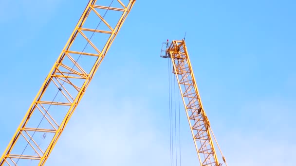 Large Construction Site Several Busy Cranes Dusk Clear Blue Sky — Stockvideo